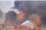 A huge fire broke out in a transformer store, about 200 transformers b...